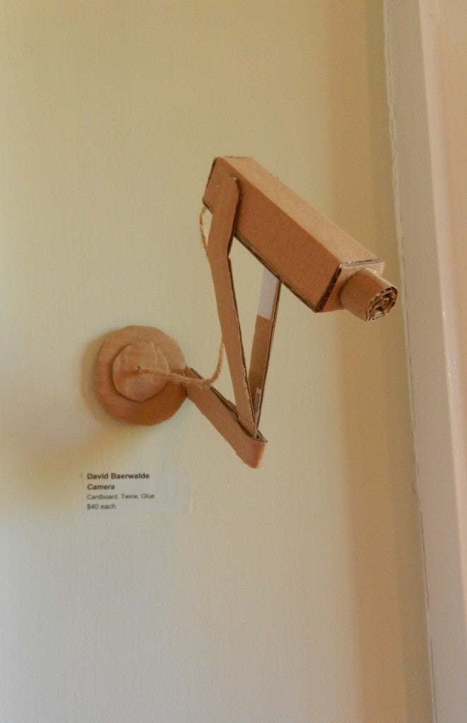 David Baerwalde's cardboard security cameras, $40 at Swan Coach House Gallery.
