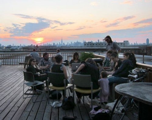 Regina Rex members on the roof of their gallery's building.