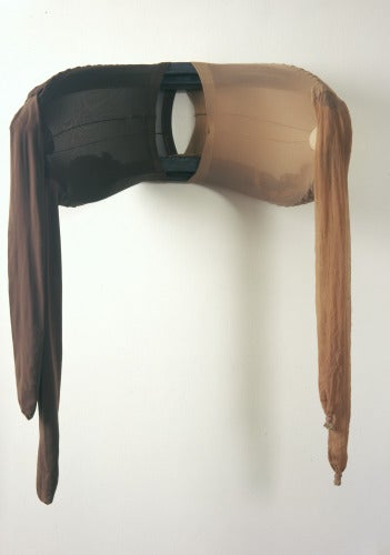 Senga Nengudi, RSVP, 1976/2003, nylon mesh and found bicycle tire, 2 by 2 feet by 8 inches.