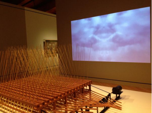 John Douglas Powers,lalu, 2011; wood, steel, plastic, electric motor, and video projection, 57 by 80 by 108 inches.