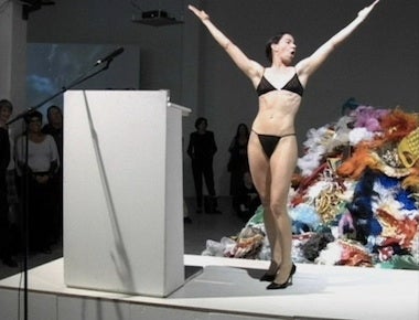 Andrea Fraser performing Official Welcome, 2001.