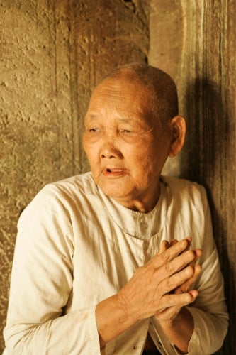 John E. Ramspott, Female Monk (Cambodia); printed on aluminum, 20 by 30 inches.