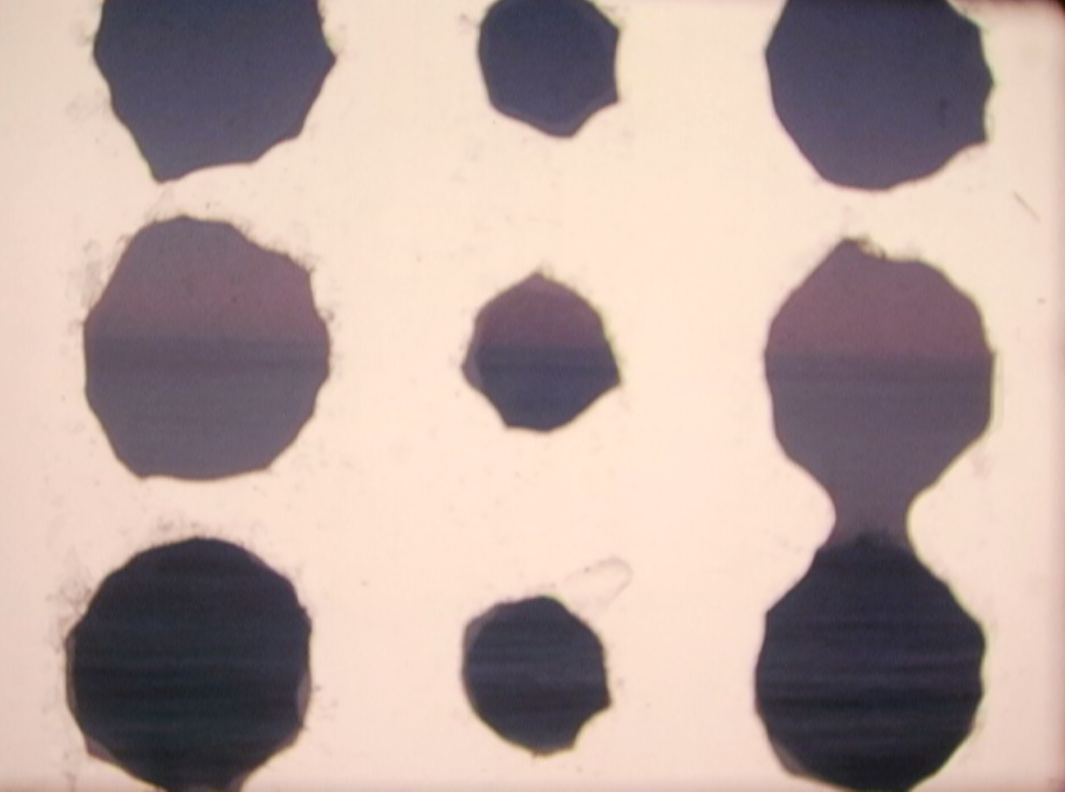Erin Colleen Johnson, still from To Sea, 2011, showing a strip of Morse code.