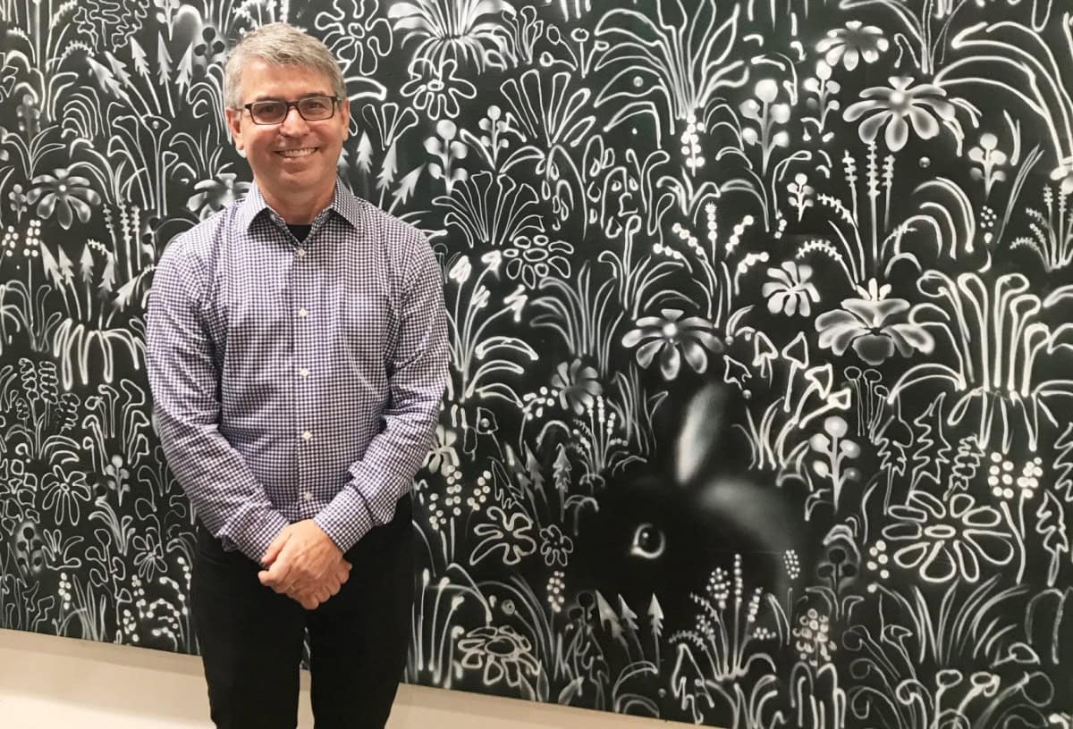 Joe Peragine in front of a work in "After the hunt," his current show at Marcia Wood Gallery.