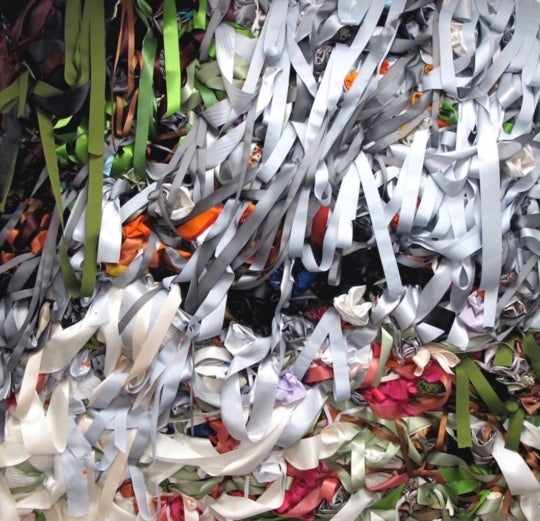 billowing layered ribbons pinned to a canvas