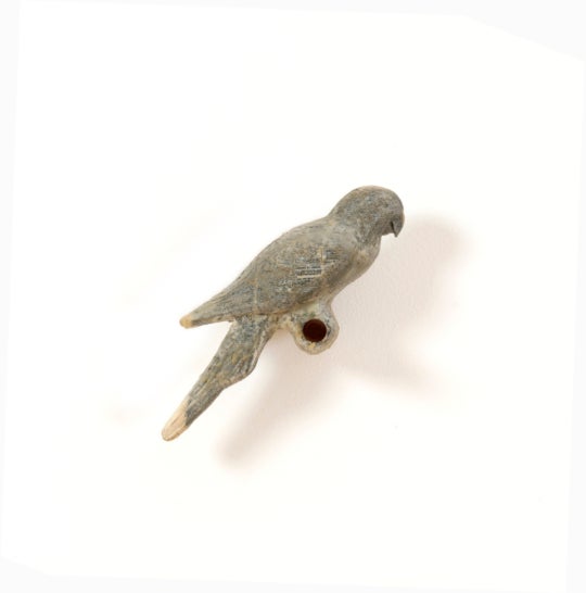 installation image of paper mache bird on pole