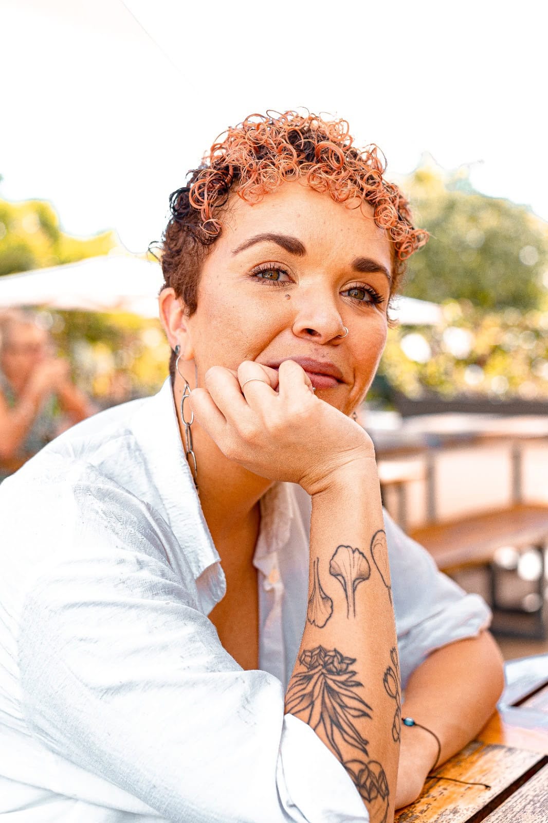 a headshot of the writer, Natalie Willis Whylly.