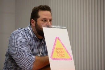 Documentation of How to Art Book Fair performance at the first Vienna Art Book Fair in 2019. Images by Lorenz Seidler and courtesy of Paul Shortt.